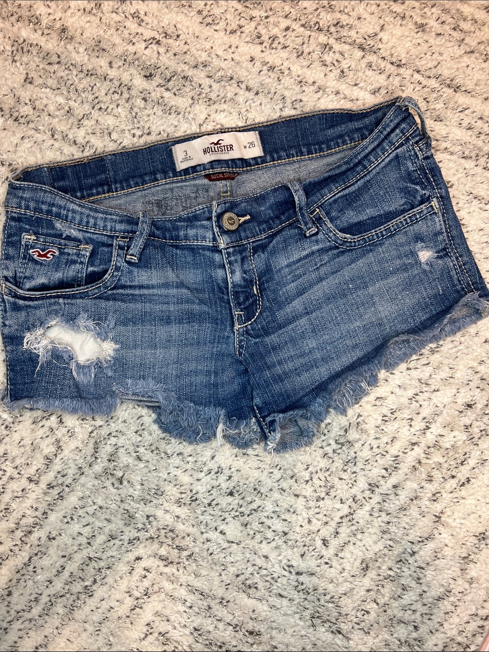 Hollister Women's Frayed Distressed Denim Short Shorts in Blue